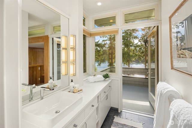 bathroom featuring tile patterned flooring and vanity