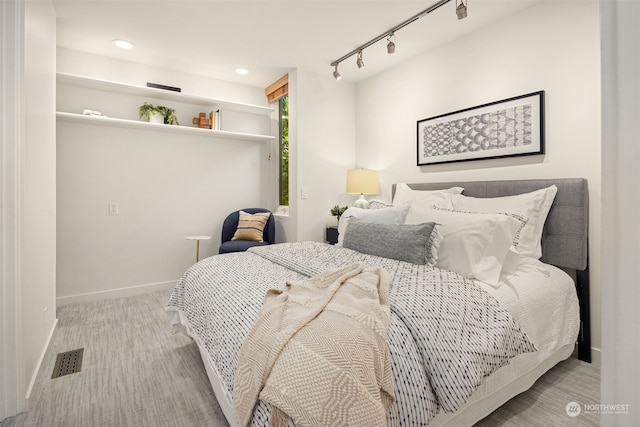 bedroom with rail lighting