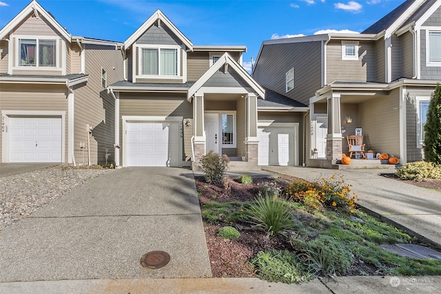 townhome / multi-family property featuring a garage