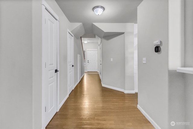 hall featuring hardwood / wood-style floors