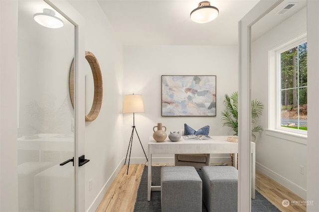 home office featuring wood-type flooring