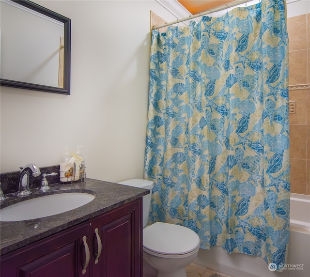 full bathroom featuring vanity, shower / tub combo, toilet, and tile patterned flooring