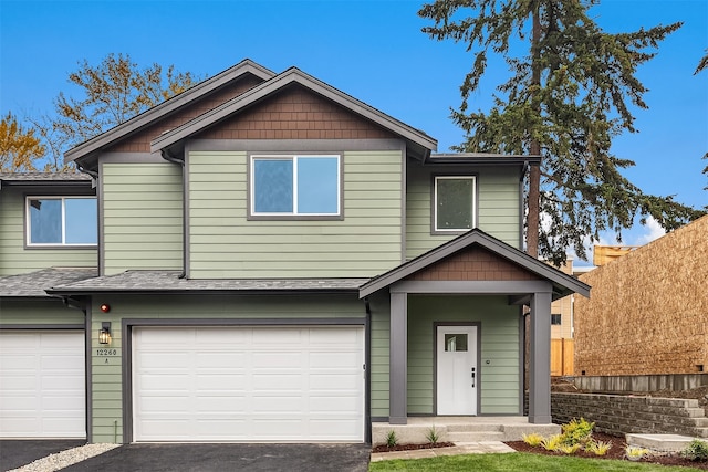 view of front of home with a garage