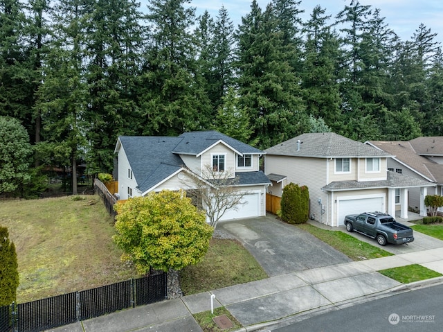 view of front of property with a garage