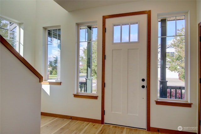 entrance foyer with light hardwood / wood-style floors