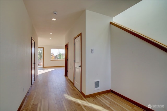 hall featuring light hardwood / wood-style floors