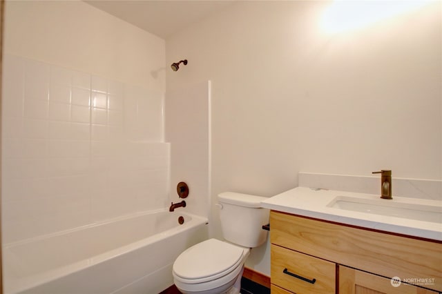 full bathroom with vanity, toilet, and  shower combination