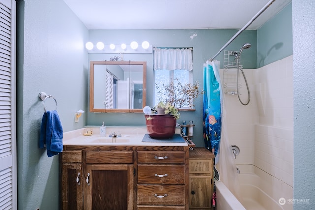 bathroom with vanity and shower / bathtub combination with curtain