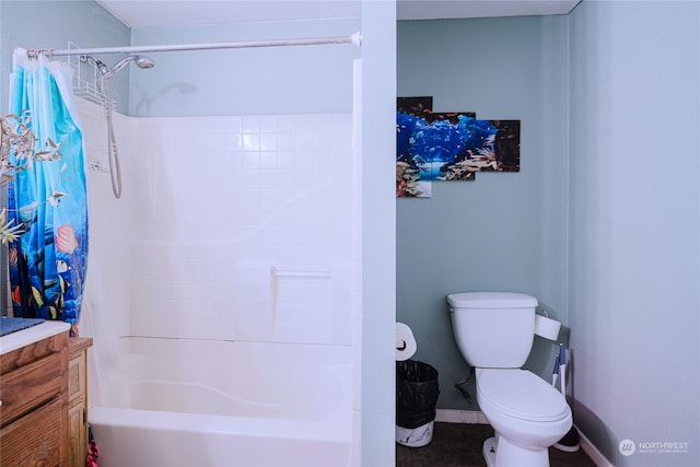 full bathroom featuring shower / bath combo, vanity, and toilet