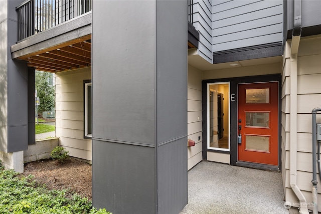 doorway to property with a balcony