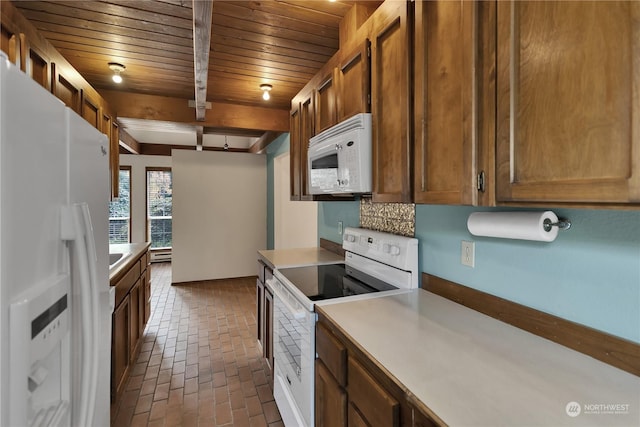 kitchen featuring white appliances, beamed ceiling, light countertops, wood ceiling, and brick floor