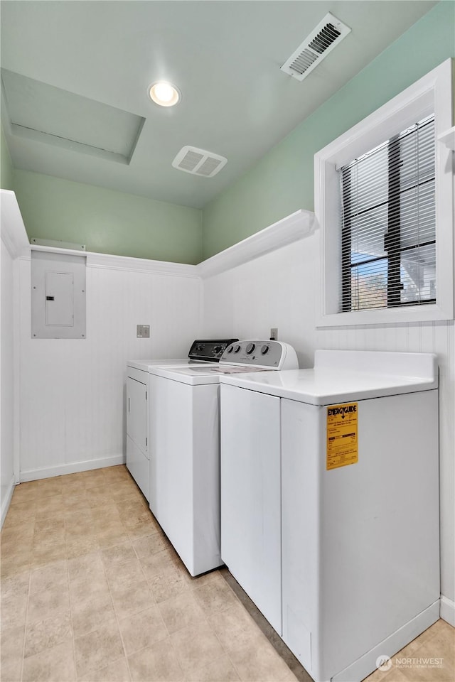 laundry room featuring visible vents, laundry area, recessed lighting, electric panel, and independent washer and dryer