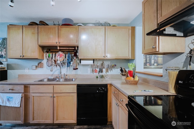 kitchen with black appliances, light brown cabinetry, sink, and extractor fan