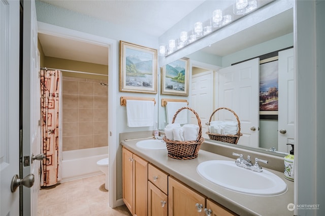 full bathroom with tile patterned floors, vanity, toilet, and shower / bath combo