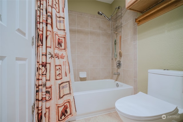 bathroom with tile patterned flooring, toilet, and shower / tub combo with curtain