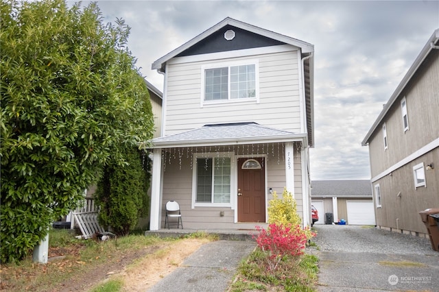 front of property with a garage