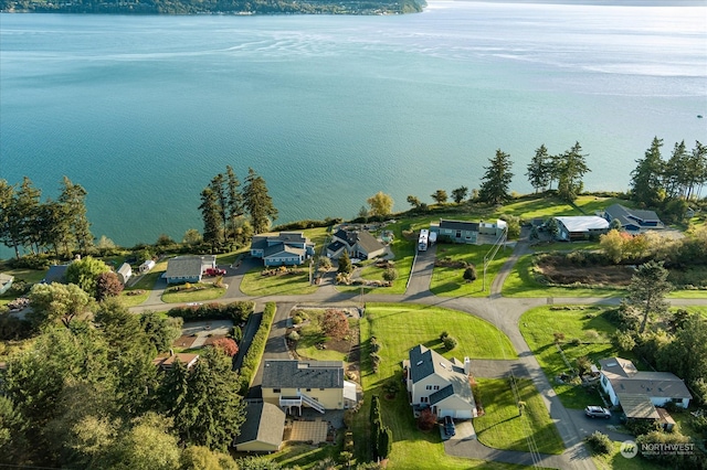 drone / aerial view with a water view