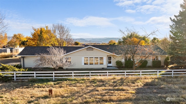 view of front of home featuring a mountain view