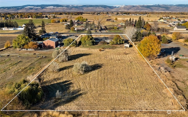 aerial view featuring a mountain view and a rural view