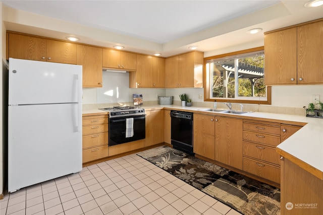 kitchen with light tile patterned flooring, sink, stainless steel stove, white fridge, and black dishwasher