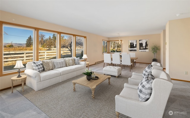 carpeted living room featuring a baseboard heating unit