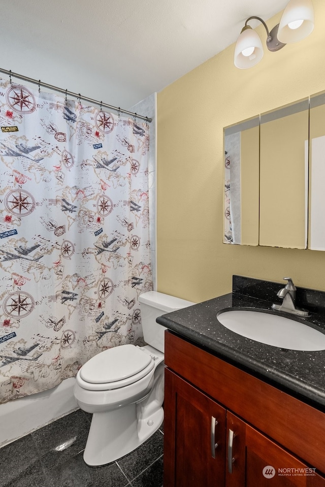 full bathroom with vanity, toilet, tile patterned floors, and shower / bath combo