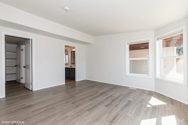 713 Main St, South Cle Elum, WA 98943 - unfurnished room featuring wood finished floors, baseboards, and a smoke detector