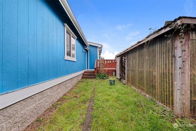 view of yard with a deck