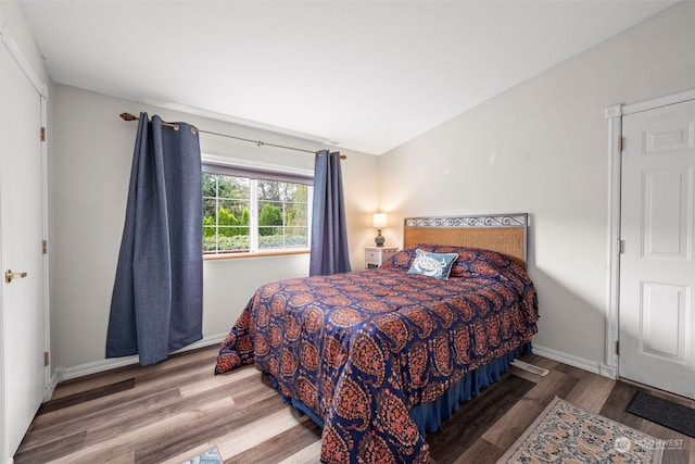 bedroom featuring hardwood / wood-style floors