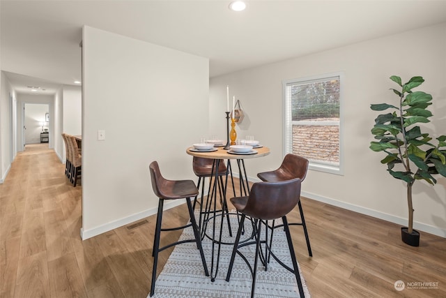 dining room featuring light hardwood / wood-style flooring