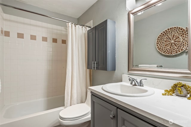 full bathroom featuring toilet, shower / tub combo with curtain, and vanity