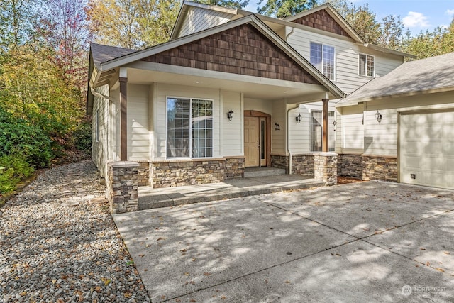 craftsman house featuring a garage