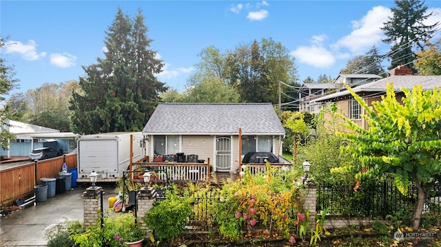 view of front of home featuring a wooden deck