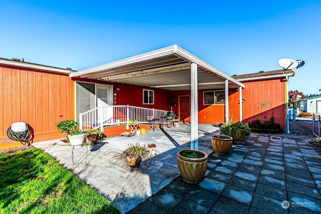 rear view of house with a patio