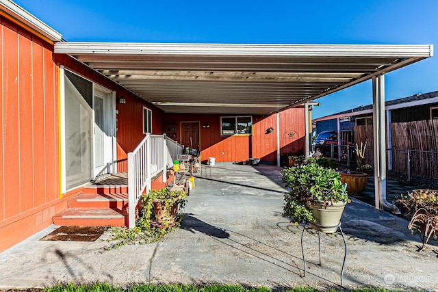 view of patio / terrace with a carport