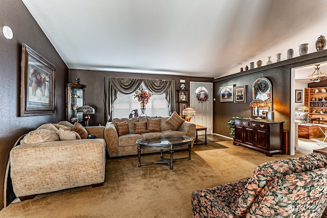 carpeted living room featuring lofted ceiling