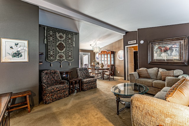 carpeted living room featuring a notable chandelier and lofted ceiling with beams