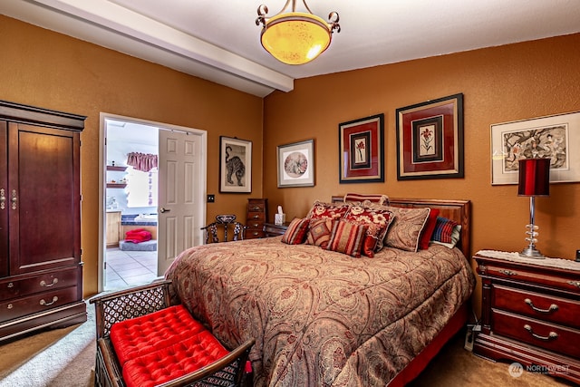 bedroom with light carpet and vaulted ceiling with beams