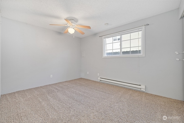 spare room featuring carpet, a textured ceiling, a baseboard radiator, and ceiling fan