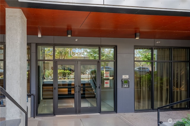 entrance to property featuring french doors