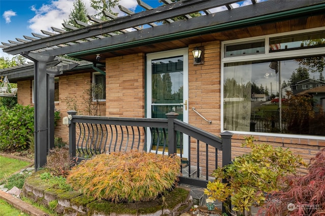 view of home's exterior with a pergola