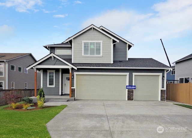 view of front facade with a front lawn and a garage