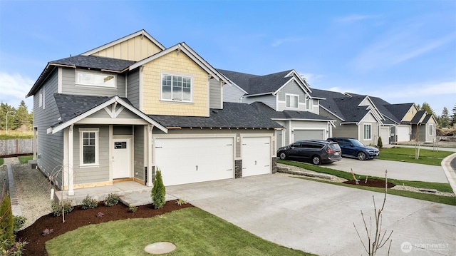 view of front of house with driveway, an attached garage, a residential view, roof with shingles, and a front lawn