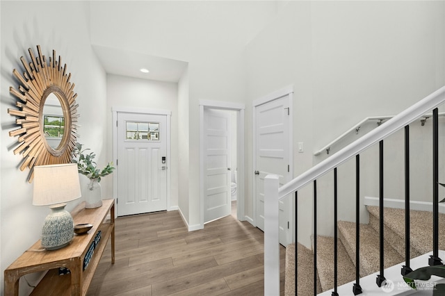 14714 88th Way SE Unit 3, Yelm, WA 98597 - foyer with wood finished floors, stairs, recessed lighting, and a high ceiling
