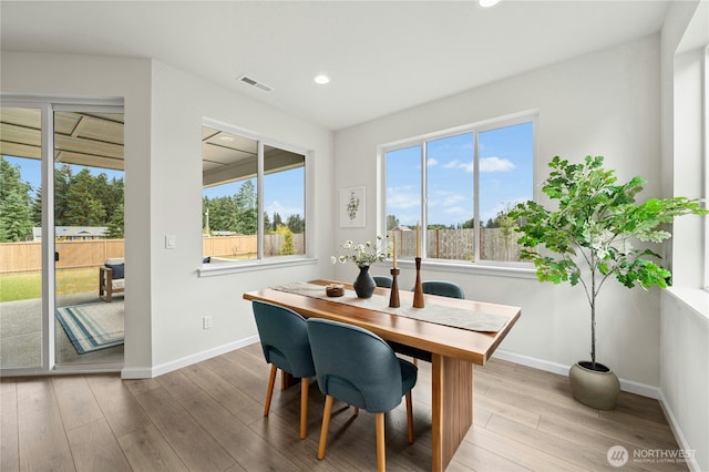 14714 88th Way SE Unit 3, Yelm, WA 98597 - dining space featuring plenty of natural light, wood finished floors, and recessed lighting