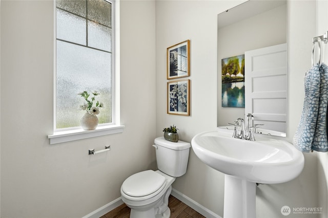 14714 88th Way SE Unit 3, Yelm, WA 98597 - half bathroom with toilet and wood finished floors