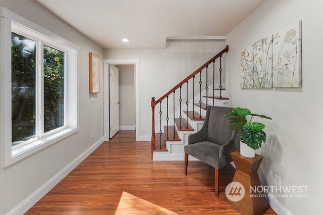 foyer entrance featuring hardwood / wood-style floors