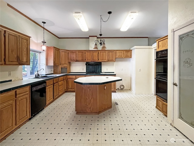 kitchen with hanging light fixtures, black appliances, sink, crown molding, and a center island