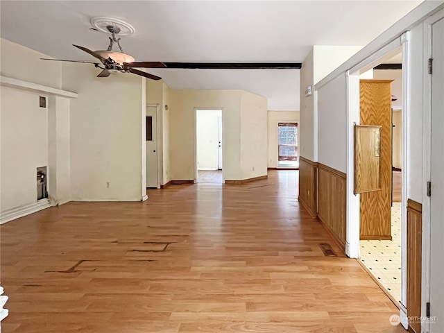 interior space featuring light wood-type flooring and ceiling fan