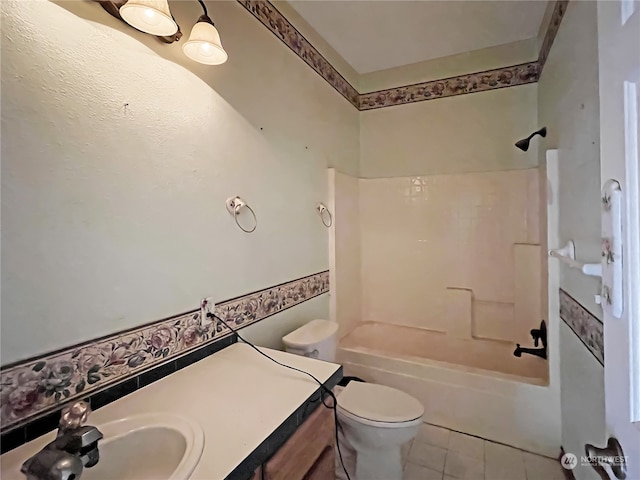 full bathroom featuring vanity, shower / washtub combination, toilet, and tile patterned floors